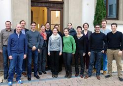 Eighteen new employees outside TTS' headquarters in Heidelberg
